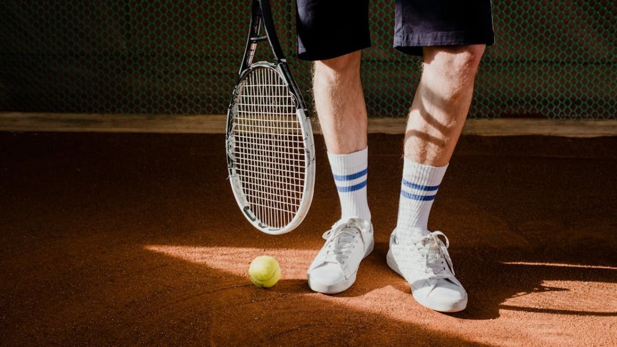 tenis e meia de jogador de tenis